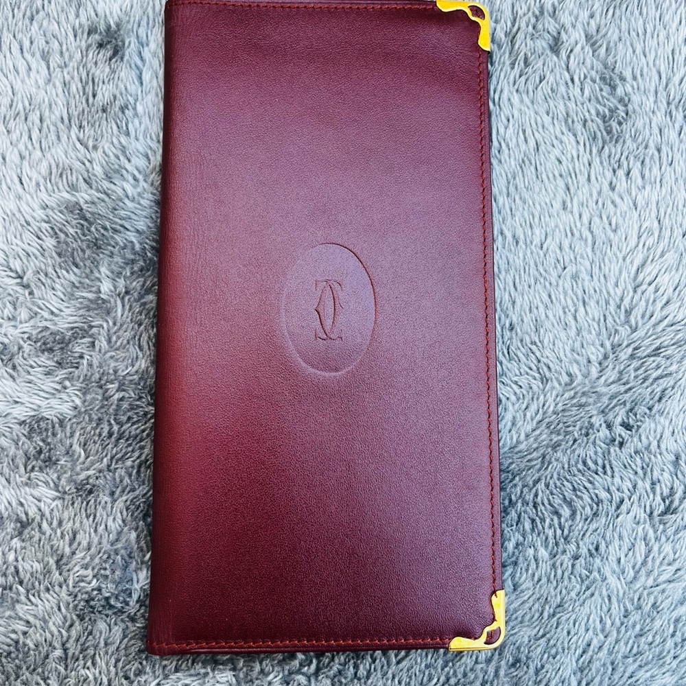 Cartier Burgundy Leather Wallet with Gold Accents